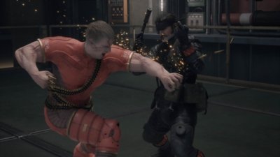 Captura de pantalla de Metal Gear Solid Delta: Snake Eater que muestra a Snake luchando contra Volgin en una pelea cuerpo a cuerpo.