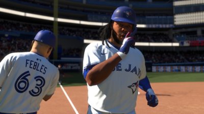 MLB The Show 24 key art showing Vladimir Guerrero Jr. rounding the bases.