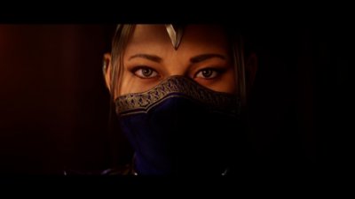 Снимок экрана из Mortal Kombat 1, демонстрирующий Китану, смотрящую в камеру