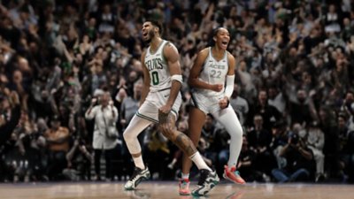 NBA 2K25 keyart showing a male and female player