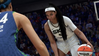 NBA 2K26 screenshot of Chicago Sky player Angel Reese in a white strip taking on an opponent in blue