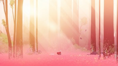 Neva screenshot showing Alba and the wolf cub in a sunlit woodland