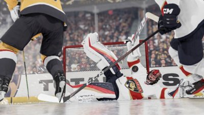 NHL 24 – Capture d'écran montrant un goal en train de plonger de manière théâtrale pour arrêter un tir