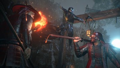 Captura de pantalla de Nioh 3 que muestra a un guerrero shinobi saltando encima de soldados desprevenidos.