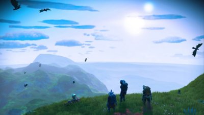 Captura de pantalla de No Man's Sky que muestra a tres personajes contemplando un paisaje espacial