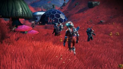 Screenshot aus No Man's Sky, der einen Charakter in einem roten Feld mit einer hexagonalen Basis zeigt