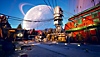 Capture d'écran de The Outer Worlds montrant un paysage urbain avec une grande tour, devant un ciel où se trouve une grosse planète.