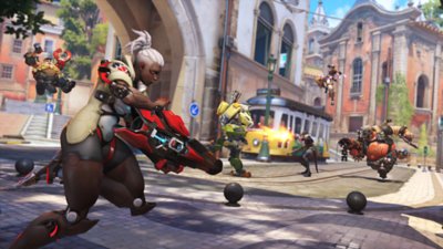 OVerwatch 2 screenshot of characters fighting on cobblestone streets.