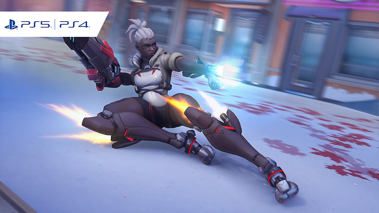 Overwatch 2 gameplay screenshot featuring a character with a gun sliding along the ground.