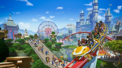 Planet Coaster - Immagine principale che mostra un'inquadratura dall'alto di un parco a tema frequentato.