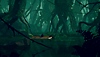 Екранна снимка на Planet of Lana, показваща Лана, потопена във вода в среда, подобна на джунгла