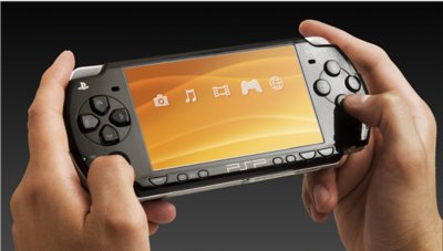 psp console held by 2 hands showing user interface