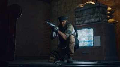 Tom Clancy's Rainbow Six Siege screenshot showing a squatting operator raising their rifle