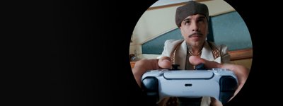 Raul Alejandro holding a DualSense controller