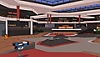 Rollerdrome – snímka obrazovky zobrazujúca bojovú arénu s televíznou kamerou v popredí