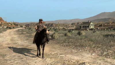 Red Dead Redemption screenshot showing John Marston riding a horse