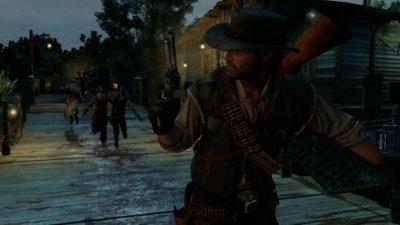 Red Dead Redemption screenshot showing Marston being chased by zombies
