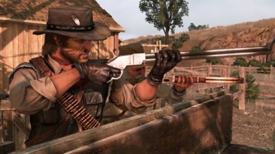 Red Dead Redemption screenshot showing John Marston holding a shotgun