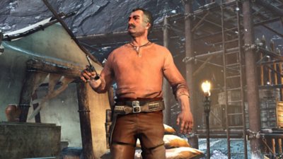 Captura de pantalla de Red Dead Redemption que muestra a un personaje parado al lado de una tienda