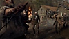 Resident Evil 4-screenshot van een aantal Ganados in hun dorp