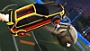 Rocket League screenshot showing a black and yellow car hitting a ball