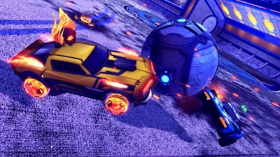 Rocket League screenshot showing a red car hitting a ball