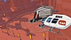 Captura de pantalla de Rollerdrome con un helicóptero volando por una arena de combate