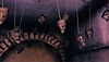 Saturnalia screenshot showing an array of masks hanging from a ceiling