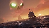 《Sea of Thieves》螢幕截圖，展示航海船隻正前往海島，島上雲朵呈現骷髏頭狀