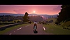 Season: A Letter to the Future captura de pantalla que muestra al protagonista montando en bicicleta bajo un cielo rosa
