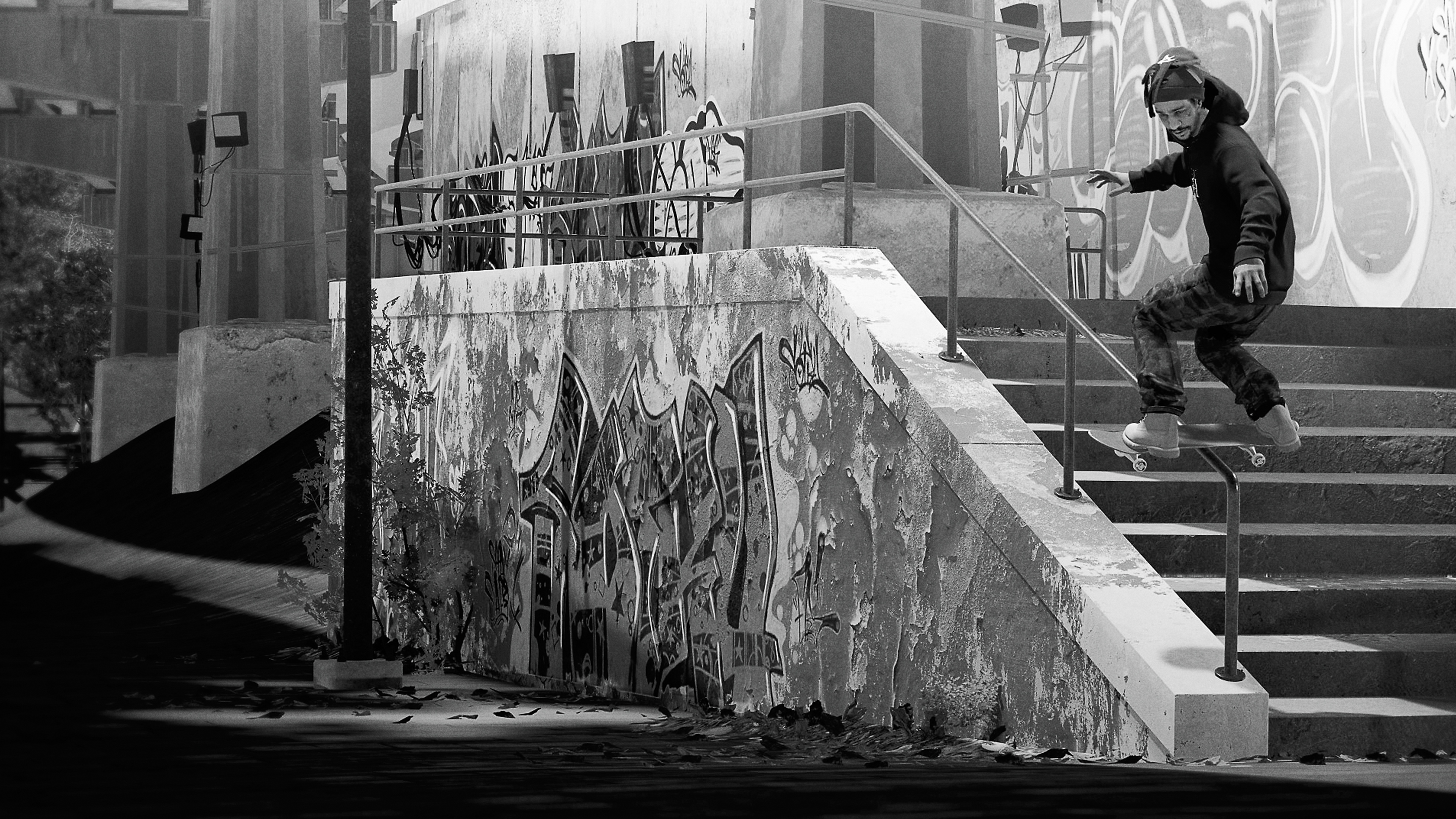 Session: Skate Sim - Capture d'écran montrant une scène en blanc et noir d'un skateboarder faisant un grind sur une rambarde