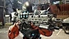Exoprimal - skærmbillede af Exosuit-figur, der kigger ned i sigtekornet på et våben