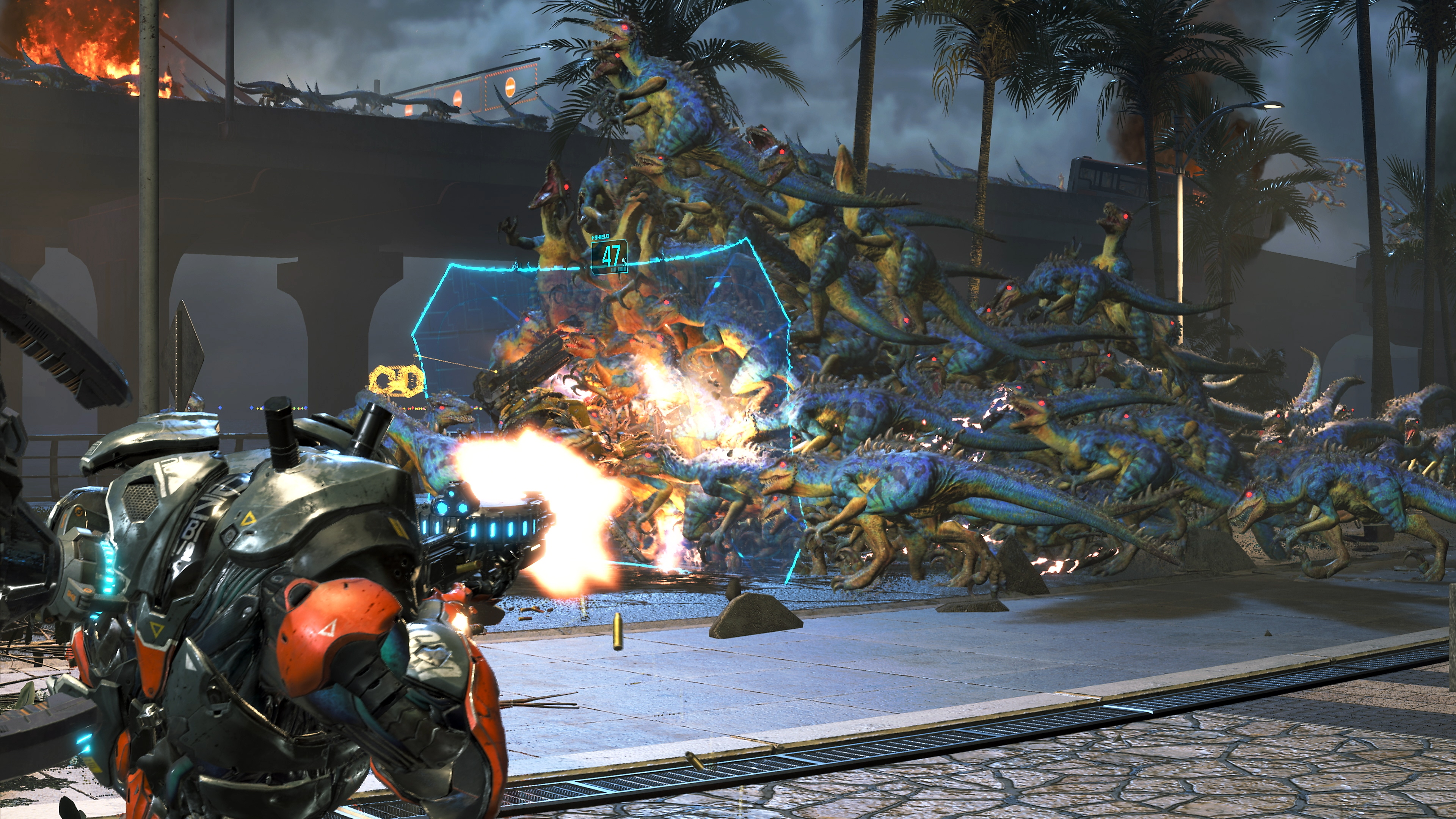 Screenshot van Exoprimal met daarop blauwe en gele dino's die naar een blokkade rennen terwijl een personage op ze schiet.