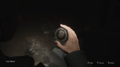 Silent Hill 2, snimka zaslona koja prikazuje predmet Man Coin