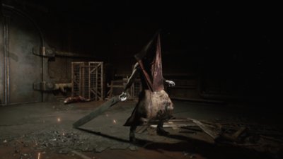 Snimka zaslona iz igre Silent Hill 2 prikazuje napuštenu, maglom obavijenu ulicu