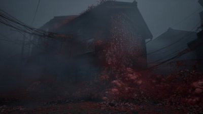Silent Hill f – Screenshot eines Hauses, das von einem verstörenden roten Gewächs bedeckt ist.