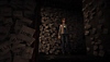 Silent Hill: The Short Message screenshot showing Anita in a room covered in offensive notes