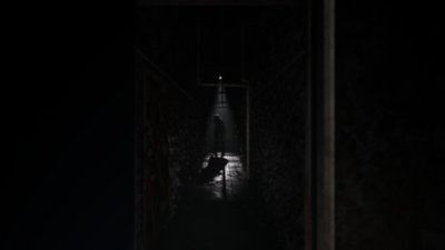 Silent Hill: The Short Message screenshot showing a creepy figure at the end of a corridor