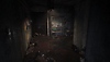 Silent Hill: The Short Message screenshot showing a dark and dirty environment