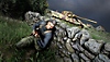 Sniper Elite 5 - captura de ecrã que mostra uma personagem a proteger-se atrás de uma parede