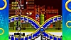Sonic Origins-skærmbillede med Sonic og Tails, der løber igennem et niveau