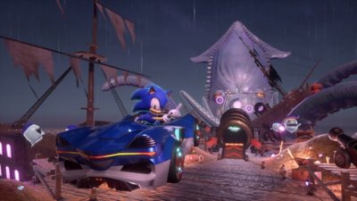 Sonic Racing: CrossWorlds – Capture d'écran montrant Sonic bondissant à travers les airs sur un circuit au thème nautique, avec un poulpe géant violet en arrière-plan