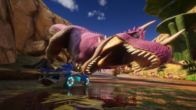 Sonic Racing: CrossWorlds – Capture d'écran montrant Sonic en train de piloter en direction d'un dinosaure violet ayant la gueule grande ouverte, le reste du circuit se poursuivant derrière ses mâchoires