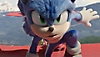 Sonic the Hedgehog sidder på hug på en rød helikopter