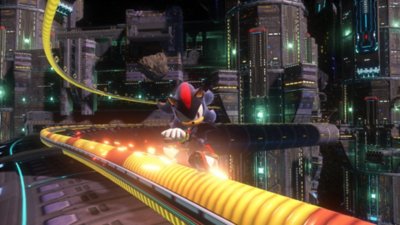 Captura de pantalla de Sonic X Shadow Generations que muestra a Shadow deslizándose sobre un riel colorido