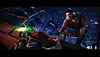 Star Wars Jedi: Survivor-screenshot van Cal die aan een richel hangt en een ander personage dat zijn hand naar hem uitsteekt