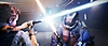 Star Wars Jedi: Survivor screenshot showing Cal Kestis locked in a lightsaber battle with an enemy
