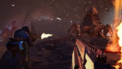《Starship Troopers: Extermination》螢幕截圖，從第一人稱視角顯示與巨大蟲族的對戰