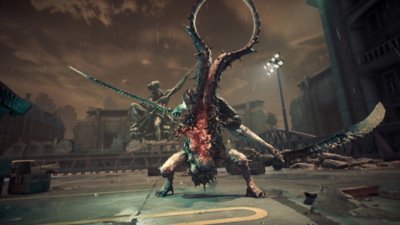 Gameplay screenshot from Stellar Blade depicting a horned beast weilding to barbed swords.
