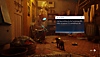 Stray – zrzut ekranu przedstawiający kociego bohatera wchodzącego w interakcję z robotem zwanym Babcią